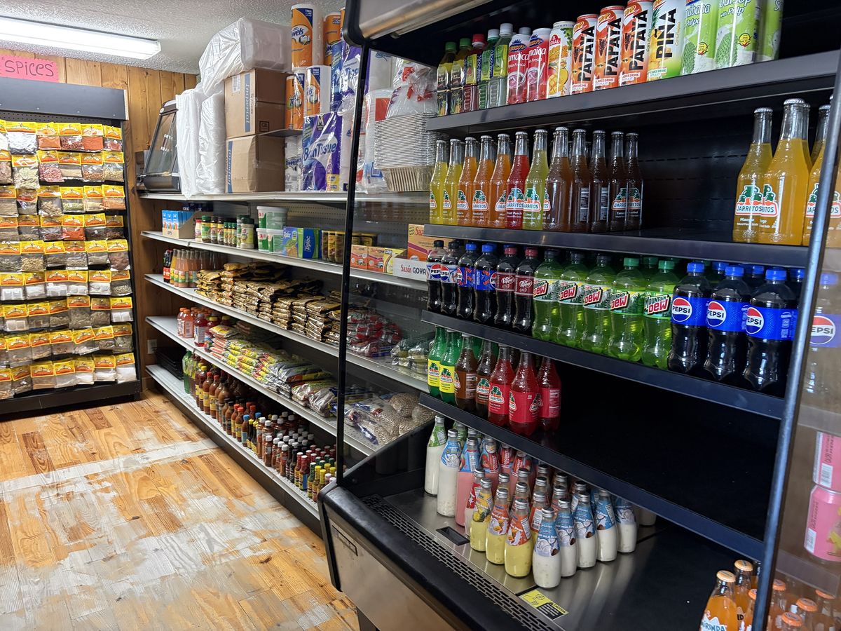 Coolers stocked with Mexican sodas, juices and coconut drinks